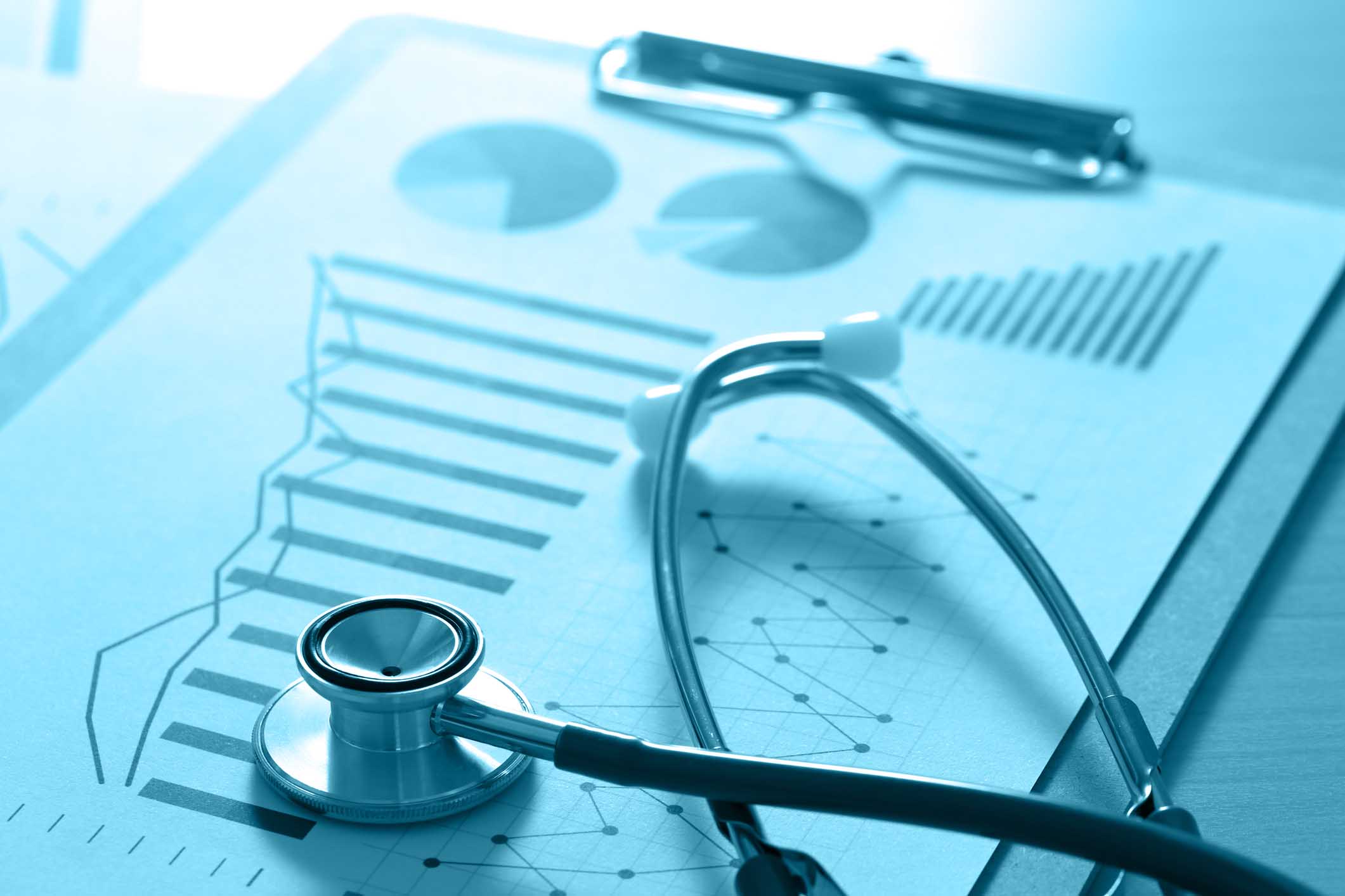 financial report chart and calculator Medical Report and stethoscope